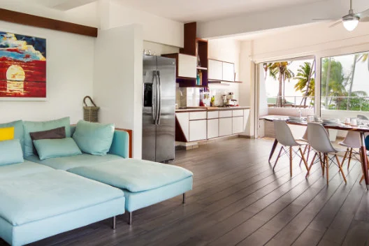 Open-concept living room in Apartment Type B Puerto Plaza